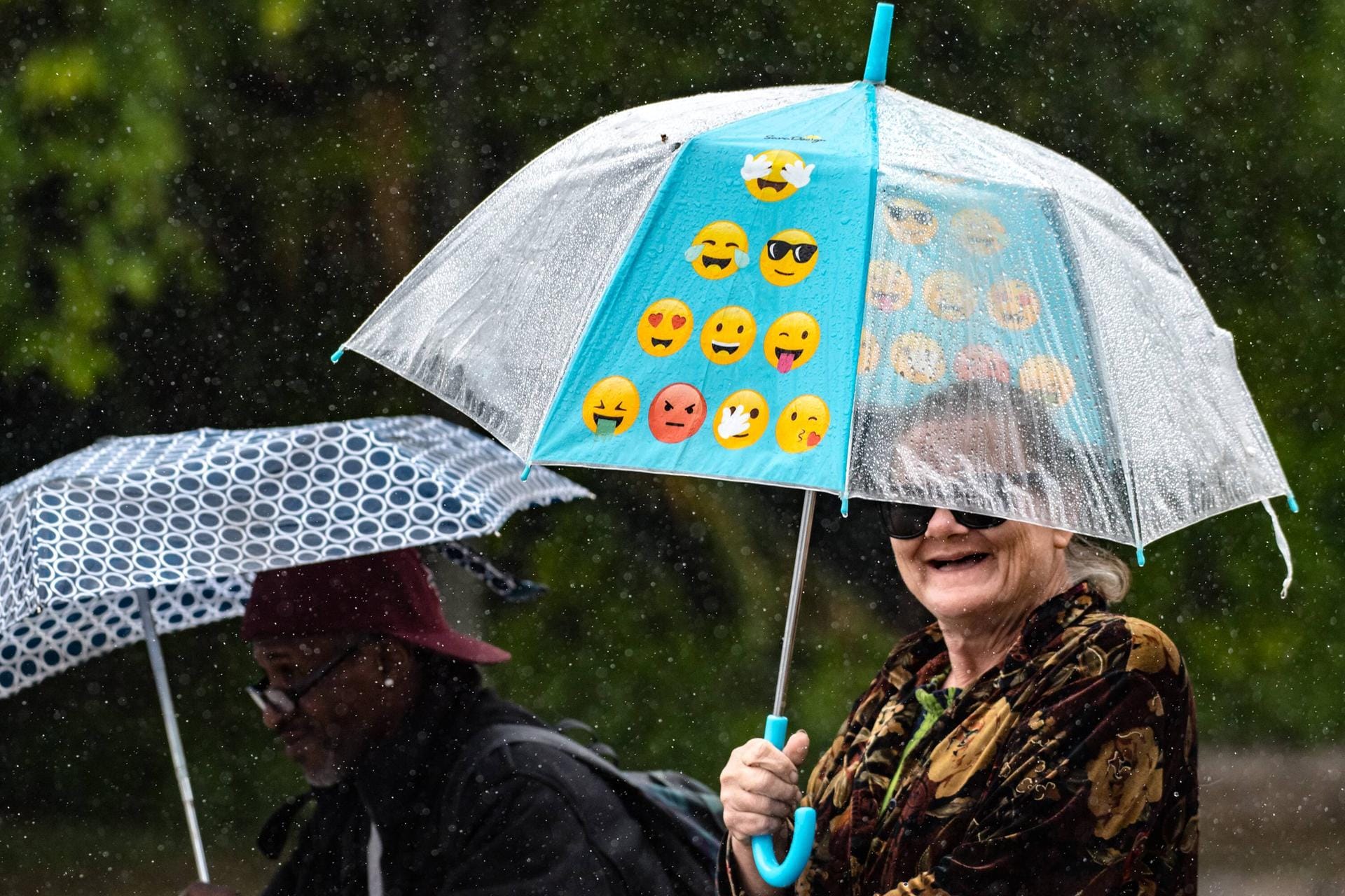 May 15 2019 San Bernardino California U S Kathy Sorthon smiles as she walks under her emoji