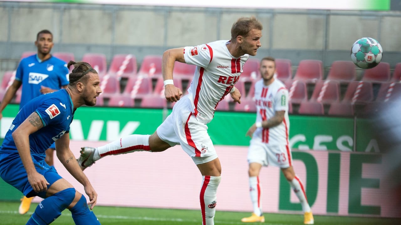 Kölns Sebastian Andersson (M) erzielt das 1:1 gegen Hoffenheim.