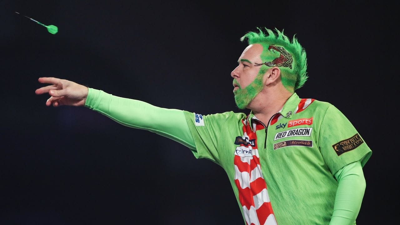 Verkleidet als "Grinch" startete Titelverteidiger Peter Wright in die Darts-WM.