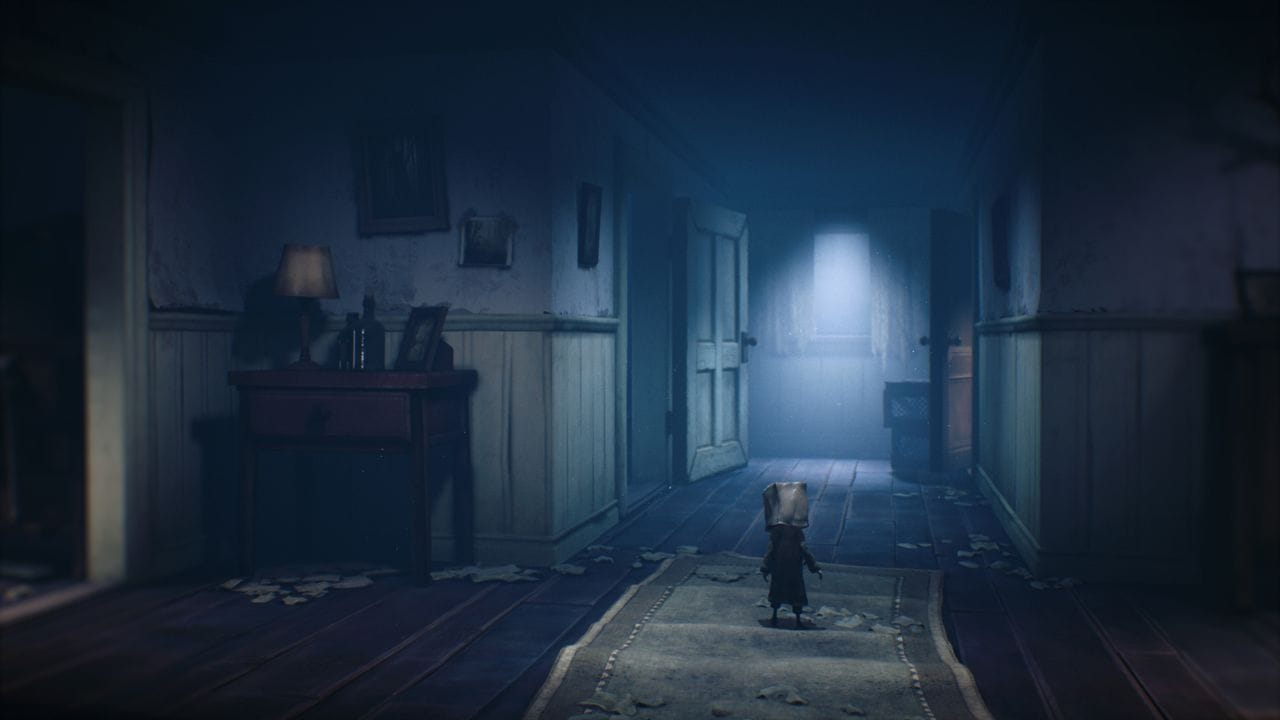 Kleiner Kerl mit extravagantem Kopfschmuck: Warum "Little Nightmares 2"-Held Mono die Papiertüte trägt, wird später im Spiel klar. Kleiner Kerl mit extravagantem Kopfschmuck: Warum "Little Nightmares 2"-Held Mono die Papiertüte trägt, wird später im Spiel klar.