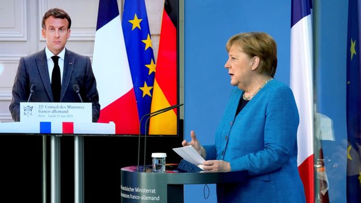 Emmanuel Macron und Angela Merkel sind bei der Spionage-Affäre einer Meinung.