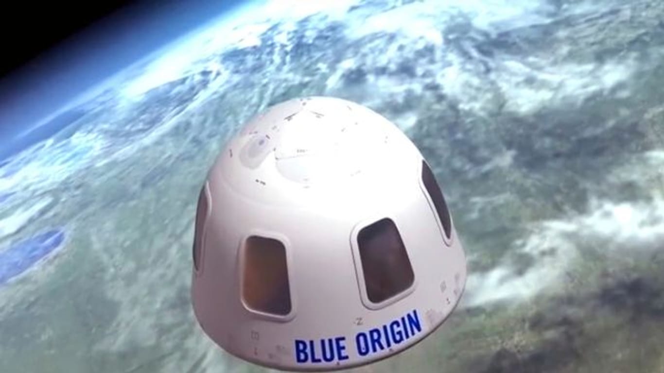 Diese undatierte Illustration von Blue Origin zeigt die Kapsel, mit der die Firma Touristen ins All bringen will: Ein Sitzplatz für den ersten bemannten Weltraumflug ist für 28 Millionen US-Dollar versteigert worden.
