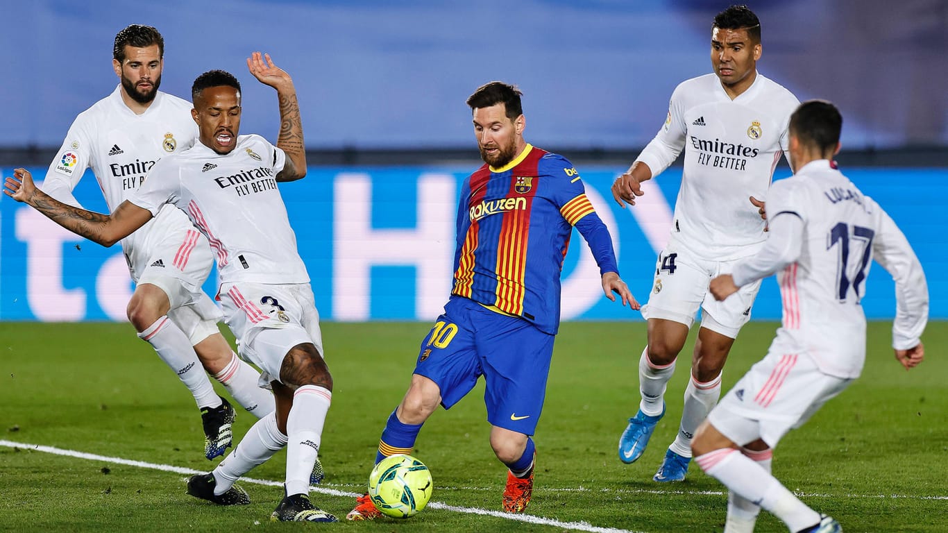 Lionel Messi und Spieler von Real Madrid: Das Traditionsduell könnte künftig nicht mehr in Spanien stattfinden.