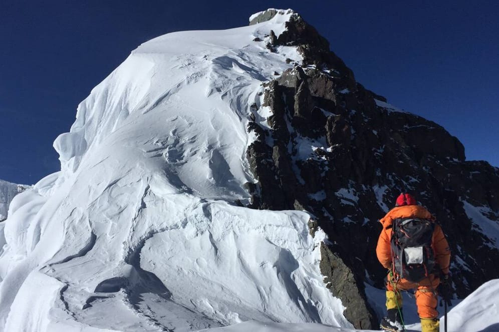 Bergsteiger am Mount Broad Peak in Pakistan (Symboldbild): Einem Südkoreaner ist es als erstem Menschen mit einer Behinderung gelungen, die 14 höchsten Gipfel der Welt zu erklimmen.