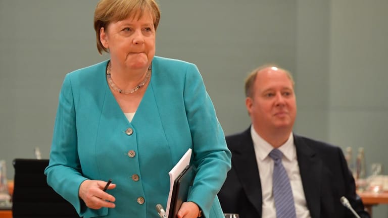 Angela Merkel und Helge Braun: Der Minister ist Merkels Mann für das Grobe.