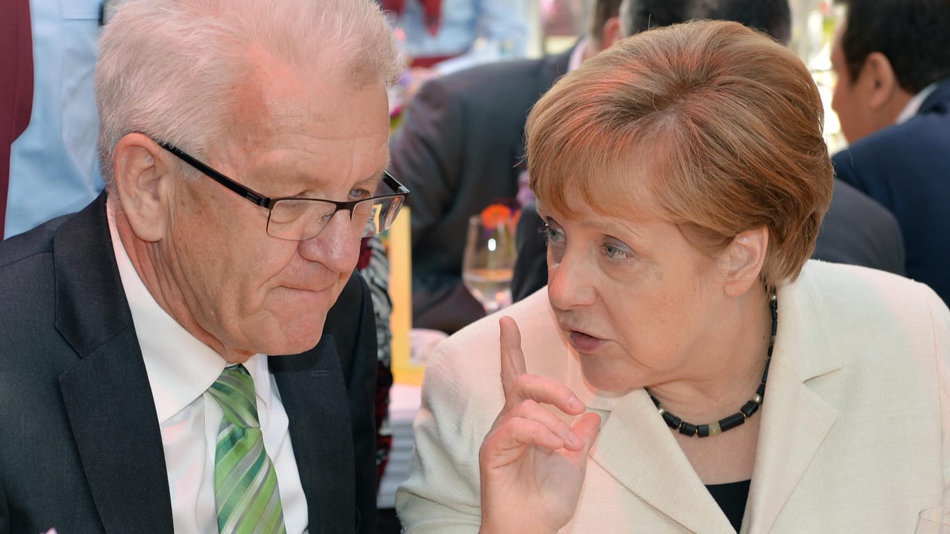Kretschmann und Merkel bei einer Veranstaltung im Juli. Ein Traumbündnis ist Schwarz-Grün für die Wähler nicht.