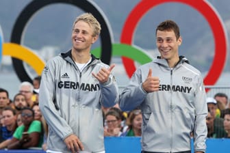 Haben im Segeln die Bronze-Medaille gewonnen: Erik Heil (l.) und Thomas Plößel.
