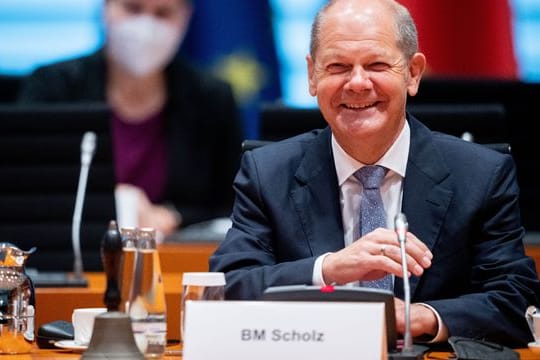Olaf Scholz lächelt