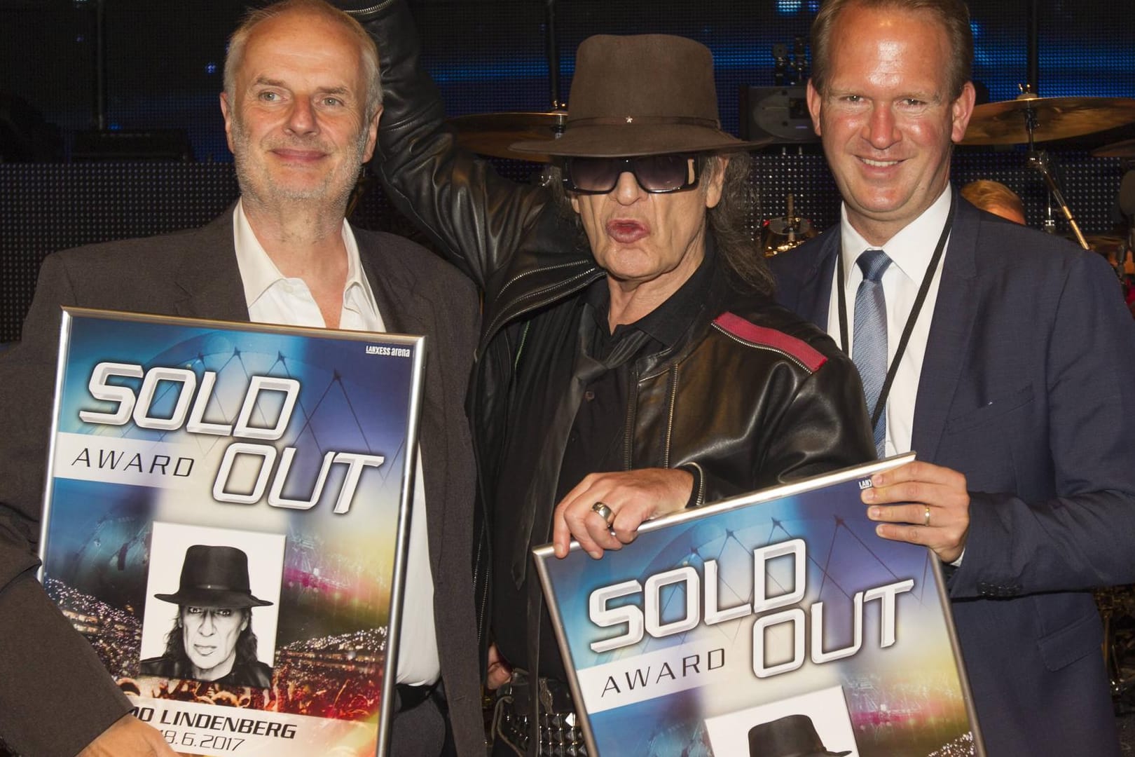 Roland Temme (links) mit Udo Lindenberg und dem Chef der Lanxess-Arena, Stefan Löcher (Archivbild): Der Konzertveranstalter organisierte Tourneen für zahlreiche Top-Stars.