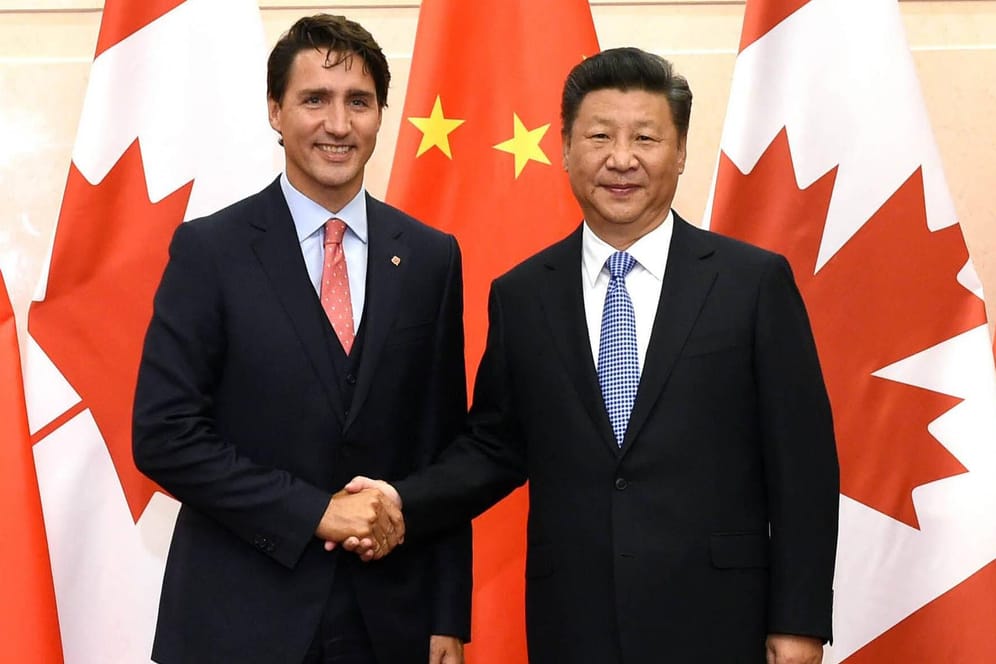 Kanadas Premierminister Justin Trudeau (li.) und Chinas Staatschef Xi Jinping (re.): Ein chinesisches Gericht verurteilte den Kanadier Michael Spavor zu elf Jahren Gefängnis