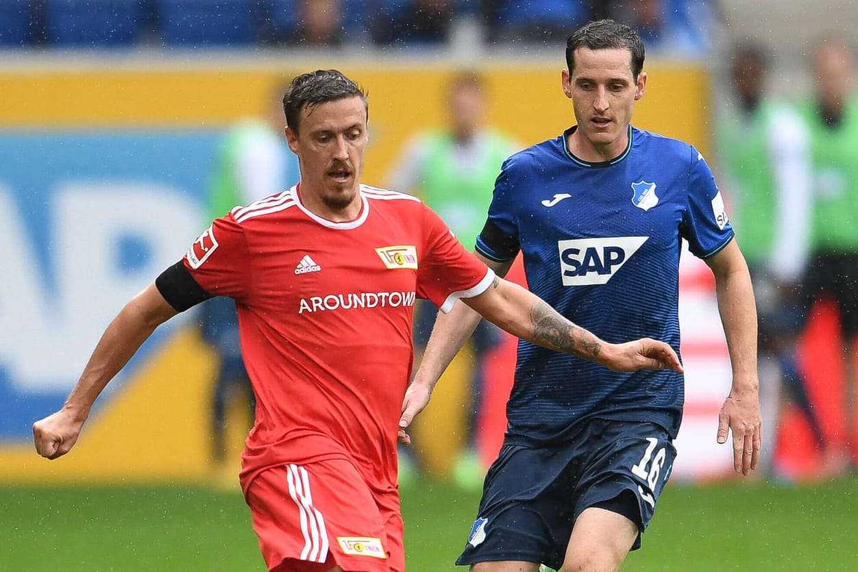 Unions Max Kruse wird von Hoffenheims Sebastian Rudy belauert (v.l.).