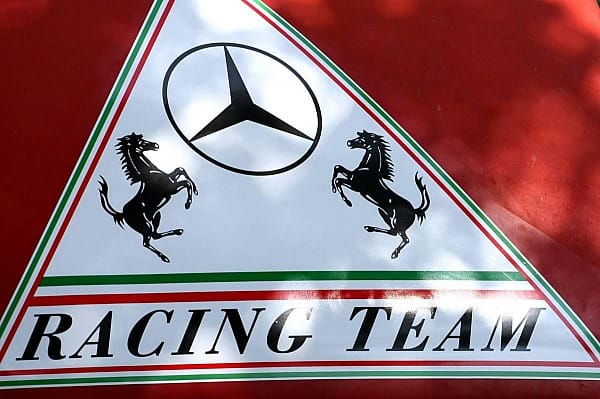 Nach dem Ferrari-Abschied von Michael Schumacher versuchen einige italienische Fans ihren "Michele" immer noch ins Herz zu schließen. So kommt es zu dieser seltsamen Kombination auf dem Plakat.