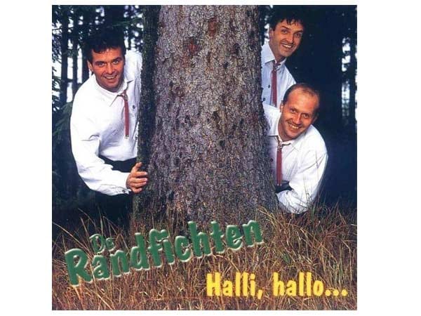 Da schlendert man unbescholten durch den Wald, blick nichts ahnend nach link und plötzlich: "Huaach! Hey, was soll denn das? Kommen Sie bitte hinter diesem Baum vor und hören Sie auf, mich so grenzdebil anzugrinsen." Das würden die Herren dann sicher auch tun, denn eigentlich sind De Randfichten ganz nette Kerle. Was die Jungs auf dem Cover ihres Albums "Halli, hallo ..." aus dem Jahr 2000 wohl geritten hat? (