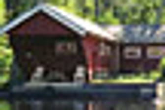 Ferienhaus auf einer eigenen Landzunge mit einem kindgerechten Sandstrand am Oxhultasee.