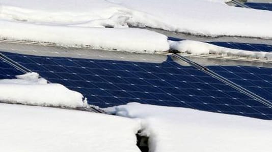 Schnee stört auf der Solaranlage.