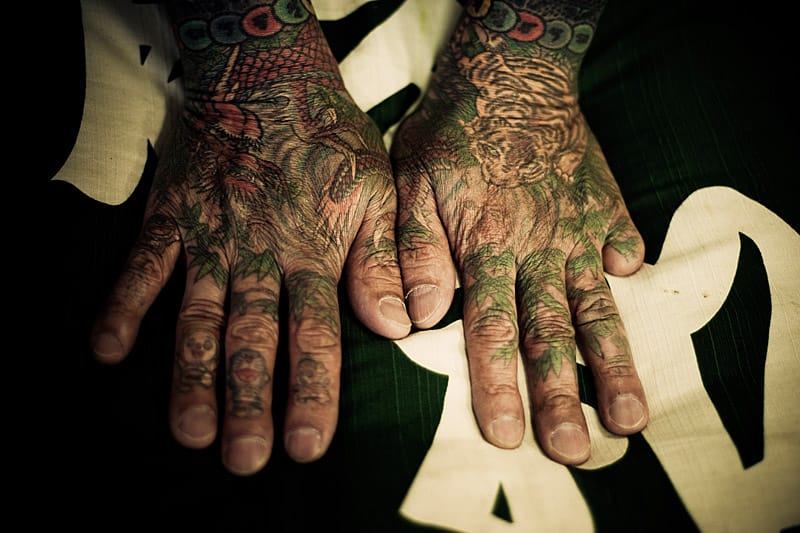 Viele Yakuza schmücken sich mit traditionellen japanischen Tattoos. Viele Yakuza schmücken sich mit traditionellen japanischen Tattoos.