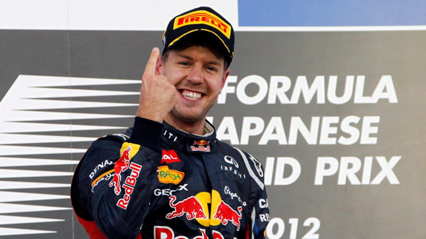 Da ist wieder der berühmte Zeigefinger: Vettel nach dem Sieg in Japan.