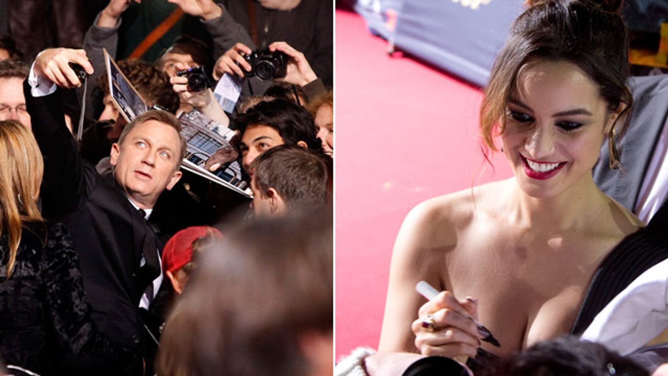 Fleißig verteilten die Hauptdarsteller Daniel Craig und Bérénice Marlohe Autogramme an die wartenden Fans.