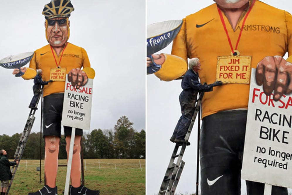 Die überlebensgroße Figur von Lance Armstrong bietet ihr Fahrrad zum Verkauf.