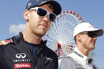 Zwei Rennfahrer, eine Linie: Sebastian Vettel und Michael Schumacher.