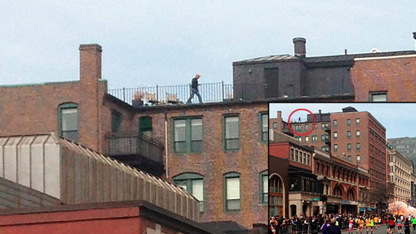 Wer ist die Person auf dem Dach?