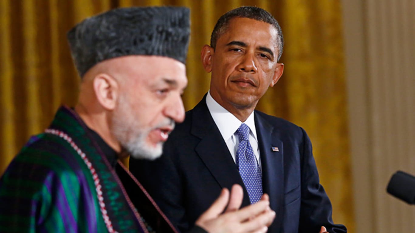 Harmid Karzai und Barack Obama: Die USA brachten dem afghanischen Präsidenten regelmäßig Geld