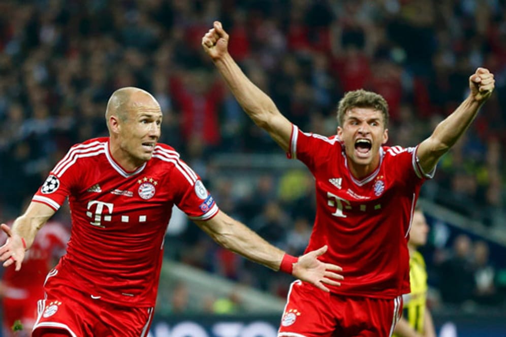 Robben und Müller feiern den Champions-League-Sieg.