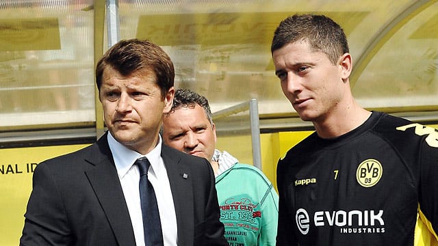 BVB-Stürmer Robert Lewandowski (re.) mit seinem polnischen Spielerberater Cezary Kucharski. BVB-Stürmer Robert Lewandowski (re.) mit seinem polnischen Spielerberater Cezary Kucharski.