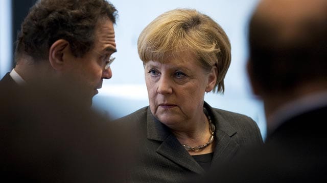 Bundesinnenminister Hans-Peter Friedrich und Bundeskanzlerin Angela Merkel