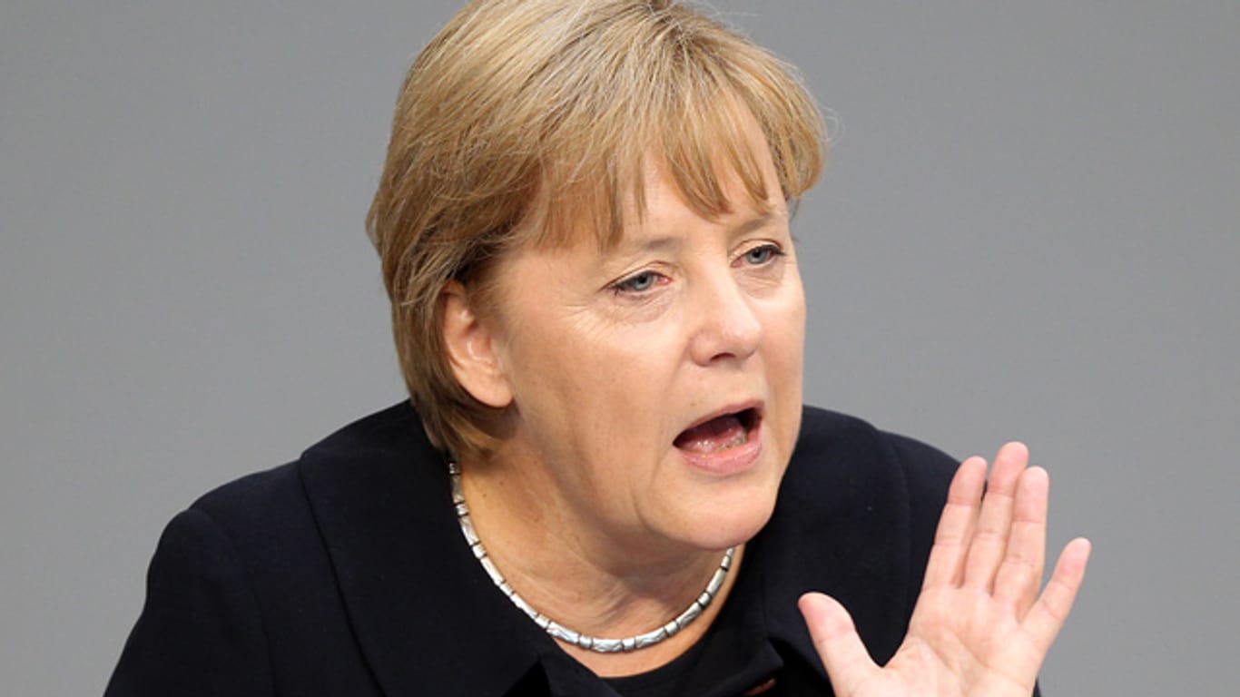 Angela Merkel 2011 im Bundestag: Die EEG-Umlage ist seitdem stark gestiegen und hat den Strom verteuert