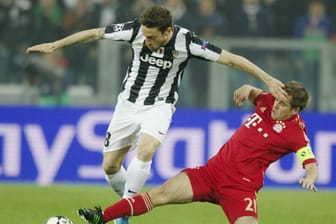 Claudio Marchisio von Juventus Turin im Duell mit FCB-Kapitän Philipp Lahm.