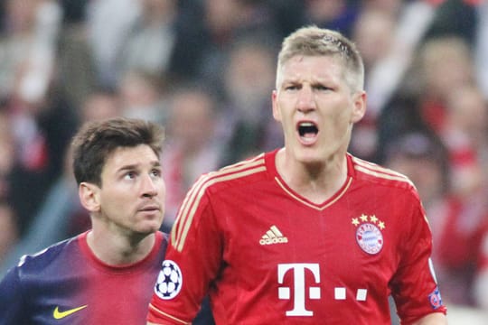 Lionel Messi (li) und Bastian Schweinsteiger im Halbfinale der Champions League 2013.