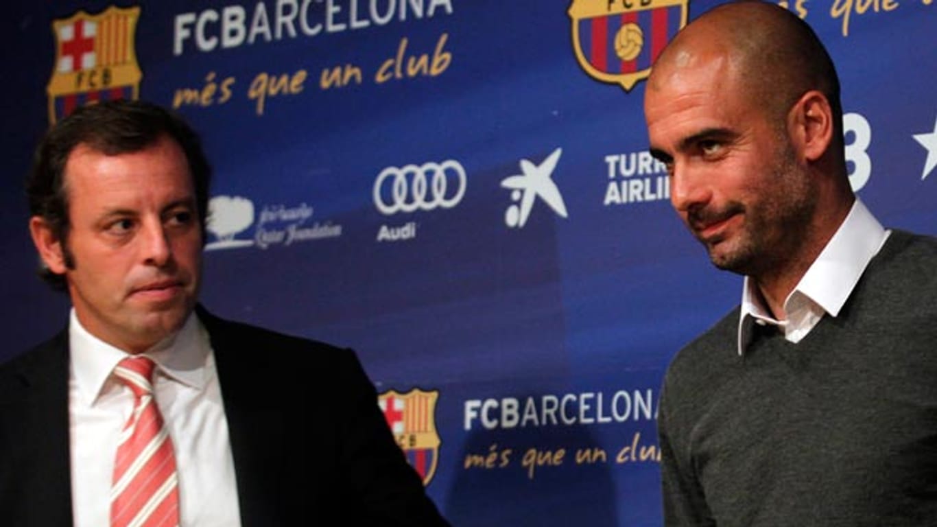 Sandro Rosell (li.) will Pep Guardiola (re.) vergessen.