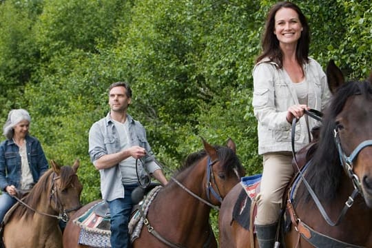 Sportarten wie Reiten und Radfahren helfen bei Inkontinenz.