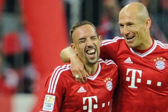 Franck Ribéry (li.) und Arjen Robben haben großen Anteil an den bisherigen vier Titeln des FC Bayern im Jahr 2013.