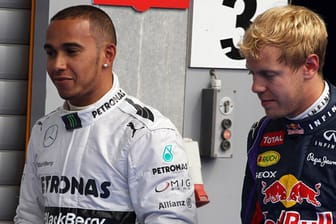 Lewis Hamilton (li.) ist genervt von Sebastian Vettels Dominanz.