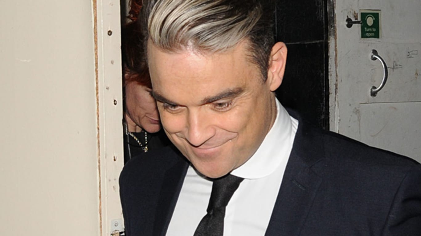 Geschmackssache: Robbie Williams scheint durch die graue Strähne gealtert zu sein.