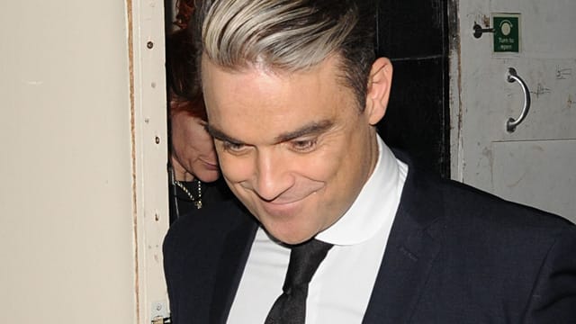 Geschmackssache: Robbie Williams scheint durch die graue Strähne gealtert zu sein. Geschmackssache: Robbie Williams scheint durch die graue Strähne gealtert zu sein.