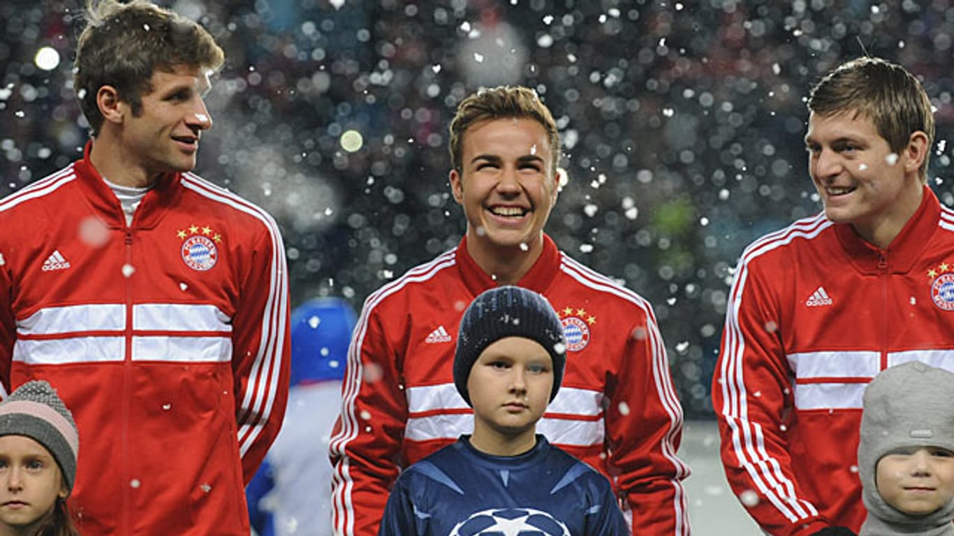 Mario Götze (Mitte) hat im Schneetreiben von Moskau gut Lachen. Er ist wieder in Top-Form.