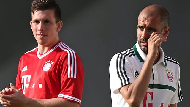 Pierre-Emile Höjbjerg (li.) und Pep Guardiola auf dem Trainingsplatz. Pierre-Emile Höjbjerg (li.) und Pep Guardiola auf dem Trainingsplatz.