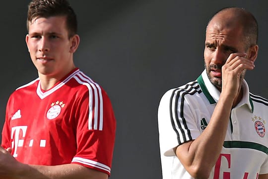 Pierre-Emile Höjbjerg (li.) und Pep Guardiola auf dem Trainingsplatz.