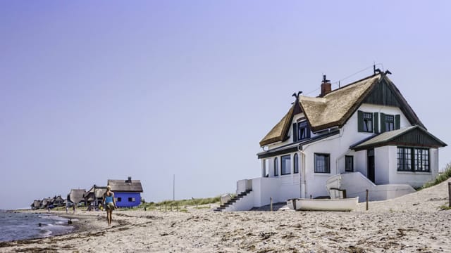 Ferienhäuser, wie hier an der Ostsee, sind beliebte Kaufobjekte