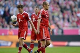 Die Bayern-Stars (hier Müller, Schweinsteiger und Robben, v.li.) müssen bis zum Ende der Saison auf ihre Prämien warten.