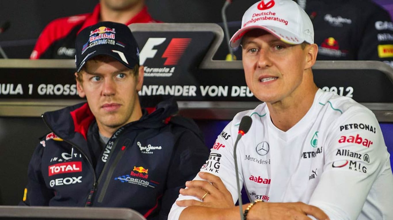 Sebastian Vettel und Michael Schumacher