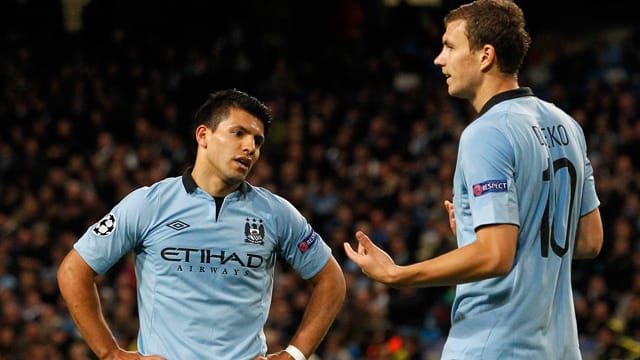 Stimmungstöter für Sergio Aguero (li.) und Edin Dzeko: Manchester City droht eine harte UEFA-Strafe. Stimmungstöter für Sergio Aguero (li.) und Edin Dzeko: Manchester City droht eine harte UEFA-Strafe.