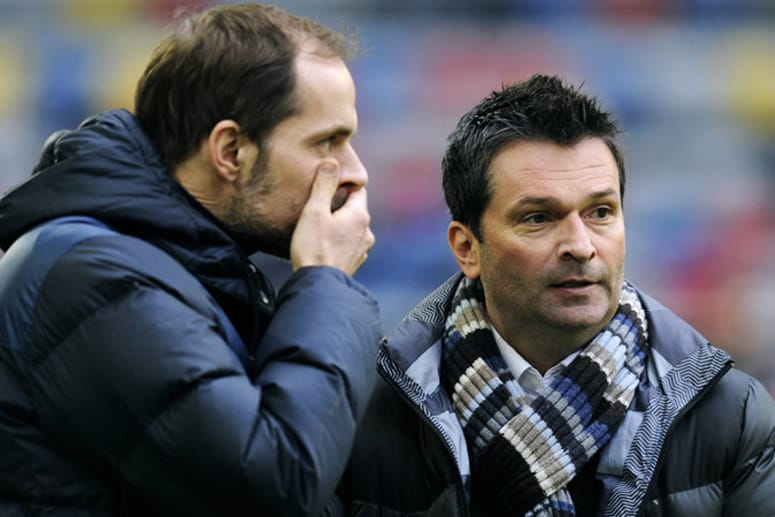 Trotz der kuriosen Trennung von Trainer Thomas Tuchel (li.) ist Manager Christian Heidel (re.) bemüht, keine schmutzige Wäsche zu waschen.