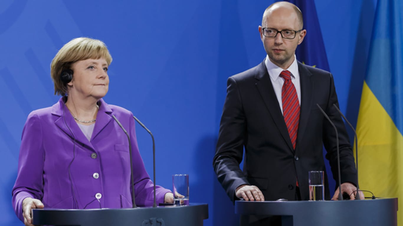Kanzlerin Angela Merkel und der ukrainische Ministerpräsident Arseni Jazenjuk sehen sich in letzter Zeit häufiger