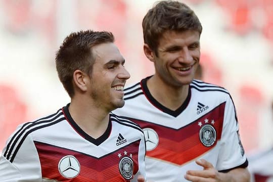 Philipp Lahm und Thomas Müller (re.)