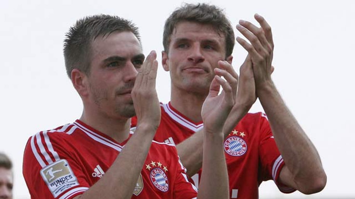 Bleiben den Bayern treu: Philipp Lahm (li.) und Thomas Müller