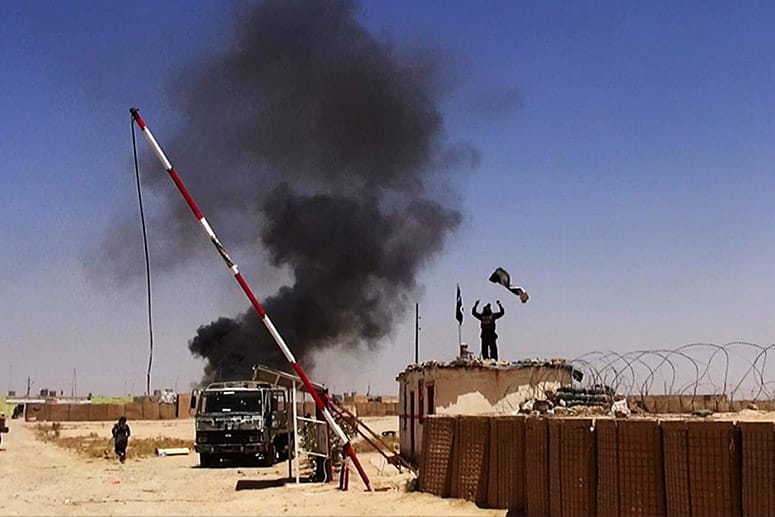 Brennende Autos und vermummte Rebellenkrieger: Im Irak droht die Lage zu eskalieren.